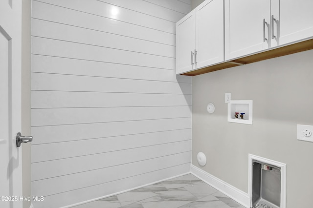 laundry room featuring washer hookup, electric dryer hookup, hookup for a gas dryer, and cabinets