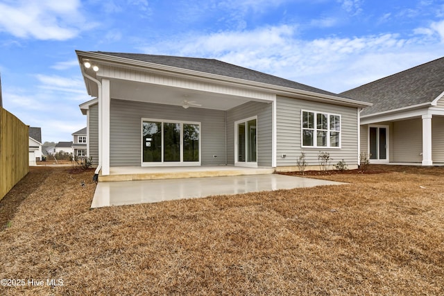 back of house with a patio area