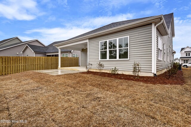 back of house with a patio area