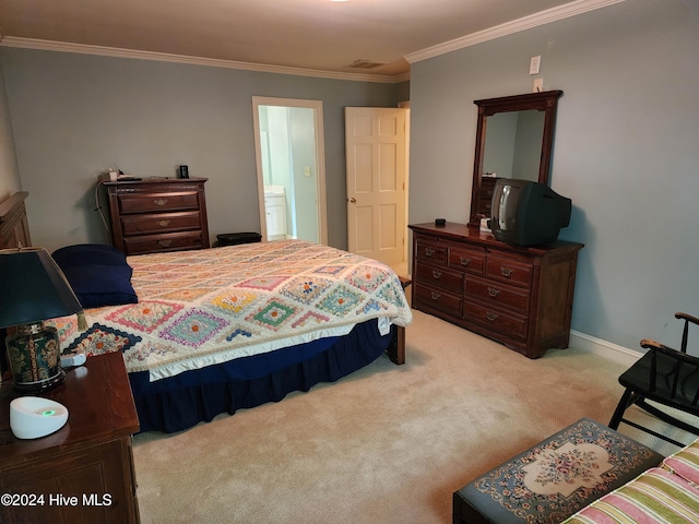 carpeted bedroom with ornamental molding