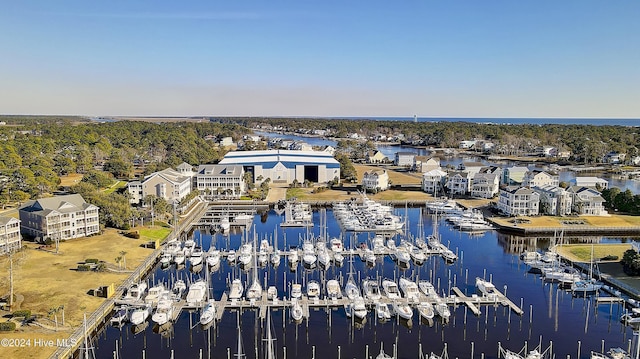 bird's eye view with a water view and a residential view