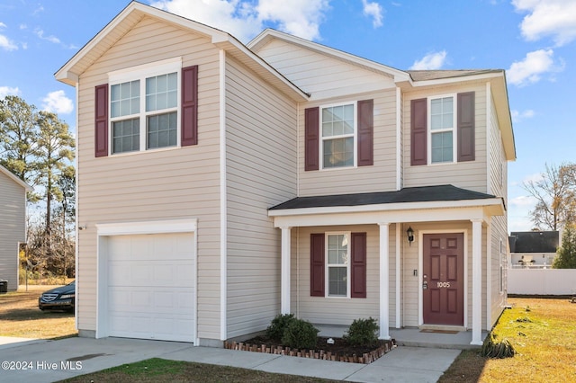 view of front of property featuring a garage