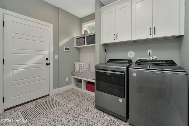 3314 Four Water Ln SW, Supply, NC 28462 - washroom with cabinet space, washing machine and clothes dryer, and baseboards