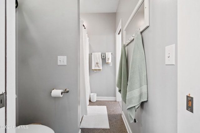 bathroom featuring tile patterned flooring