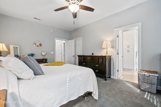 carpeted bedroom with ceiling fan