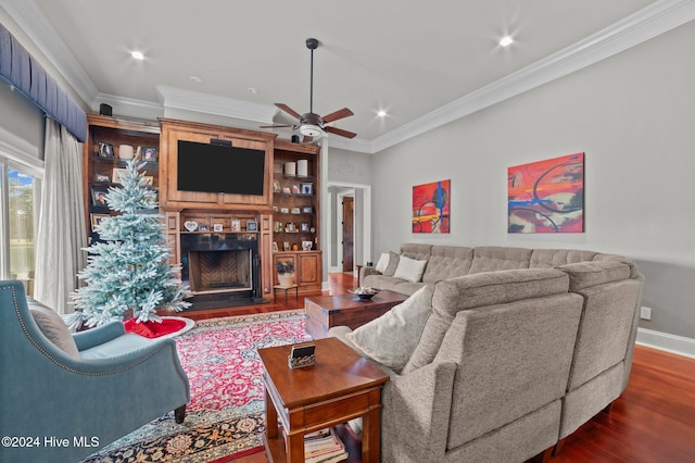 living room with ceiling fan, dark hardwood / wood-style flooring, and ornamental molding