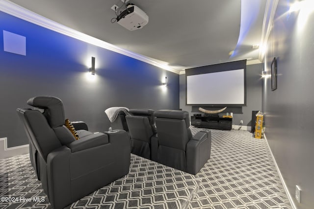 carpeted cinema featuring ornamental molding