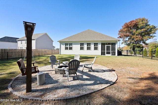 exterior space featuring a fire pit, a yard, and a patio