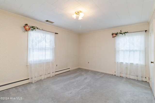 spare room with a baseboard radiator, crown molding, and light colored carpet