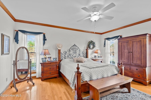 1221 NC Highway 305, Aulander, NC 27805 - bedroom featuring multiple windows, light wood-type flooring, crown molding, and ceiling fan