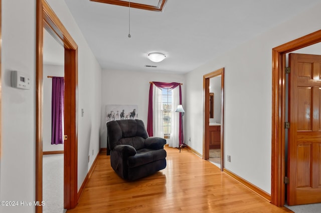 1221 NC Highway 305, Aulander, NC 27805 - sitting room featuring attic access and light wood finished floors