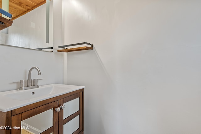 bathroom featuring vanity and wooden ceiling