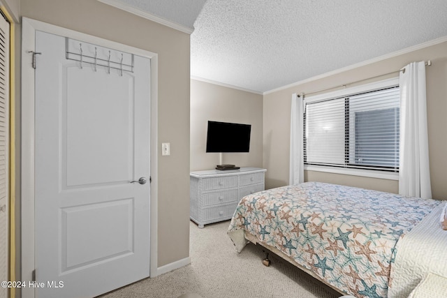 bedroom featuring light colored carpet, ornamental molding, and a textured ceiling