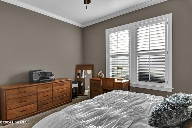 carpeted bedroom with crown molding