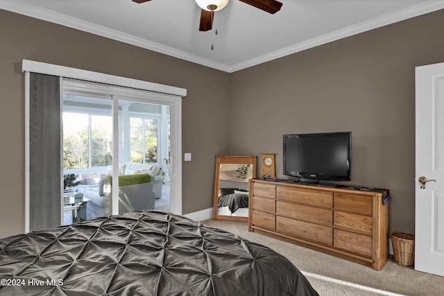 carpeted bedroom featuring access to outside, ceiling fan, and ornamental molding