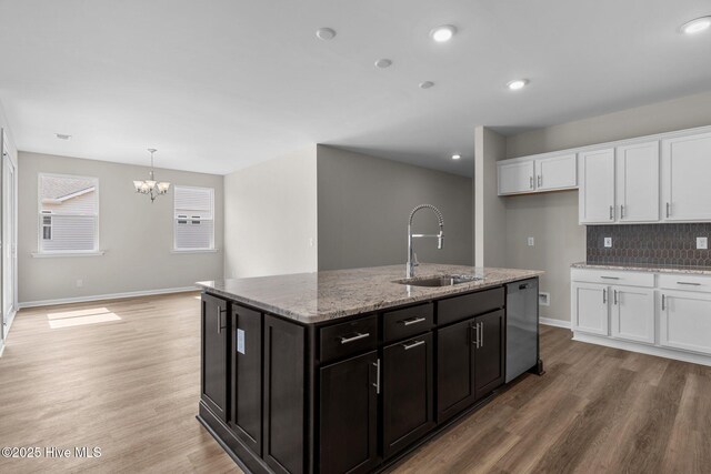 bathroom featuring hardwood / wood-style floors, vanity, and an enclosed shower