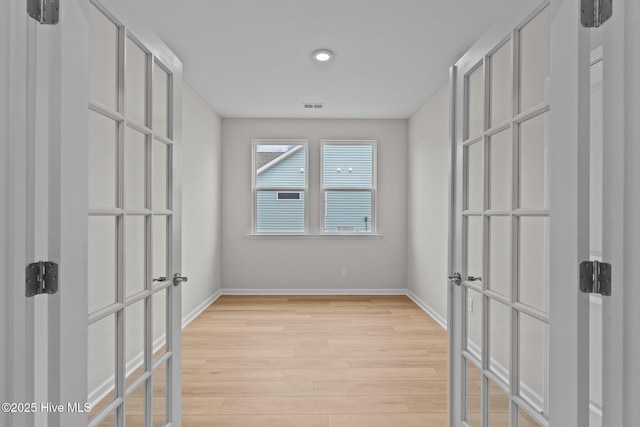 1957 Mansfield Ave SE, Bolivia, NC 28422 - interior space featuring visible vents, baseboards, and light wood-style floors