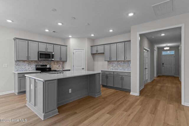 bathroom with vanity, tile patterned floors, and walk in shower