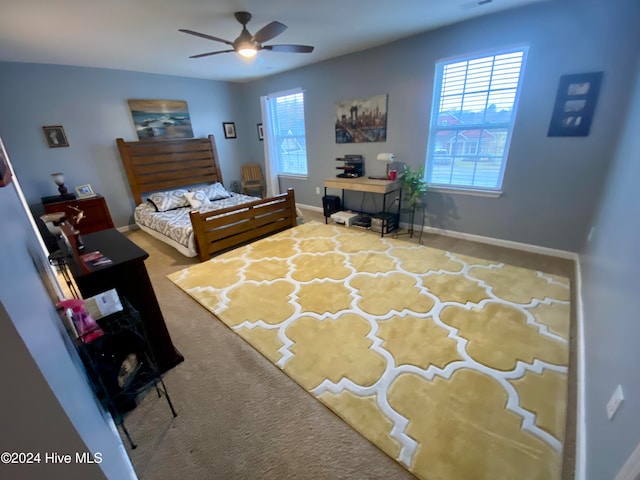 bedroom featuring carpet and ceiling fan