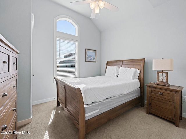 bedroom with light carpet, ceiling fan, and lofted ceiling