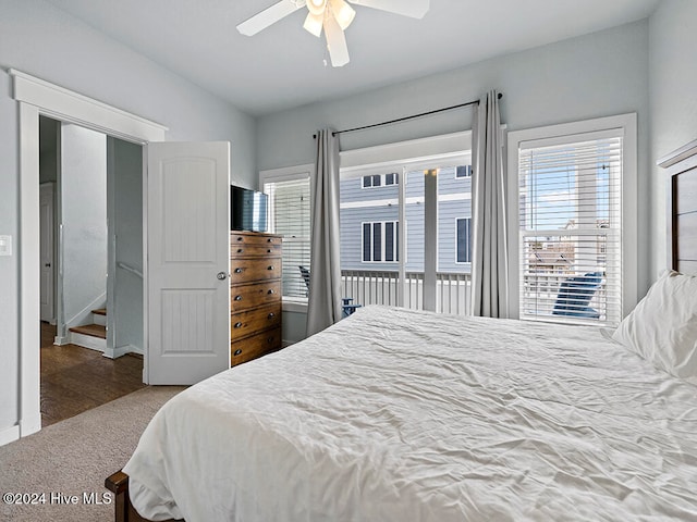 carpeted bedroom featuring ceiling fan