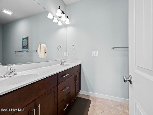 bathroom featuring tile patterned floors and vanity