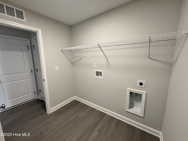 clothes washing area featuring laundry area, visible vents, dark wood finished floors, electric dryer hookup, and hookup for a washing machine