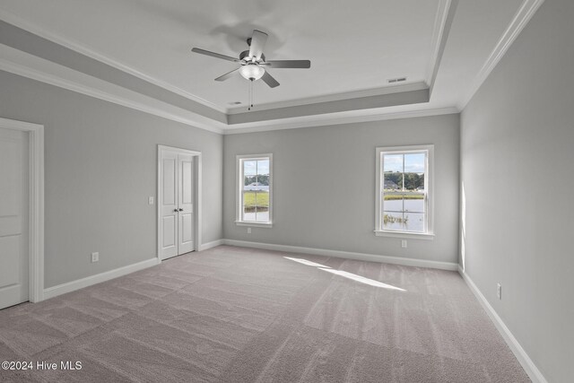 bathroom with walk in shower, vanity, crown molding, and tile patterned flooring