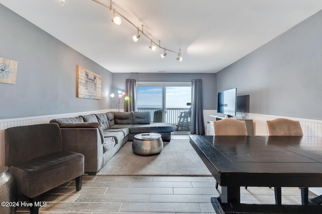 living room with light hardwood / wood-style floors