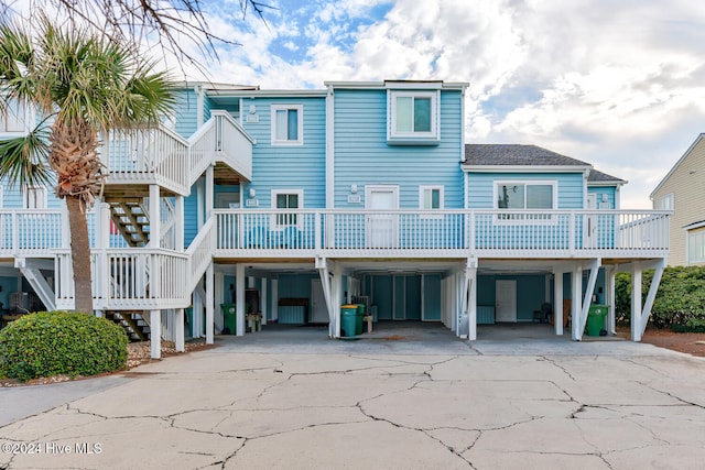 view of front of home with a carport