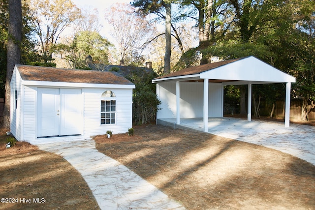 view of outdoor structure with a carport