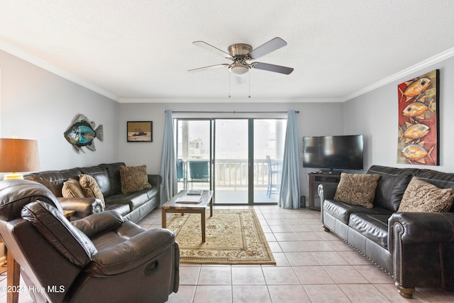 living room with a textured ceiling, ceiling fan, light tile patterned flooring, and crown molding