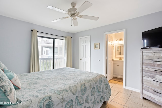 bedroom featuring light tile patterned floors, ensuite bath, and ceiling fan