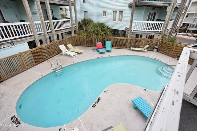 view of pool with a patio