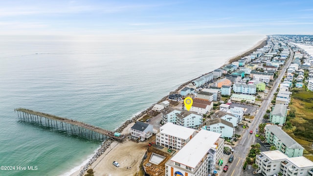 aerial view featuring a water view and a view of the beach