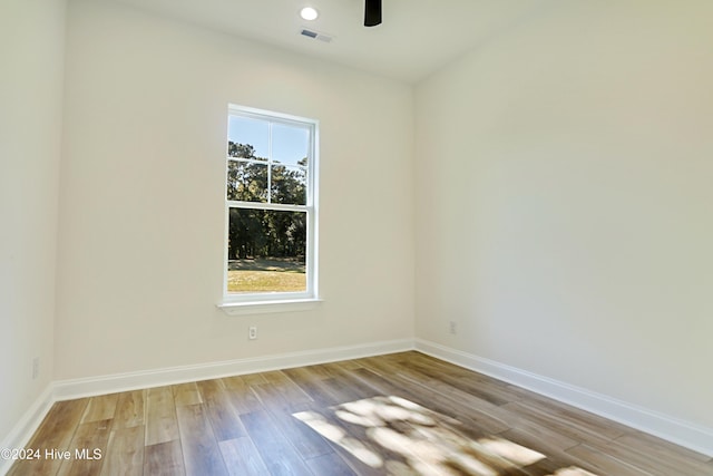115 Genoes Point Rd SW, Supply, NC 28462 - unfurnished room featuring healthy amount of natural light, wood finished floors, and baseboards
