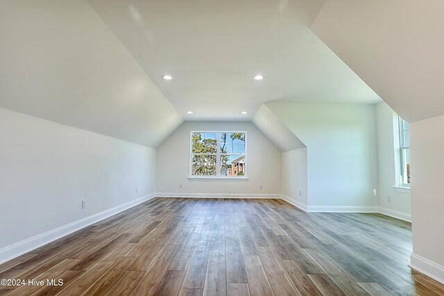 115 Genoes Point Rd SW, Supply, NC 28462 - additional living space featuring wood finished floors, lofted ceiling, baseboards, and recessed lighting