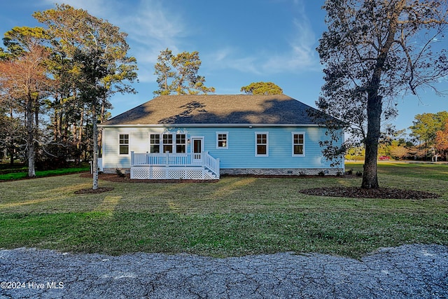 115 Genoes Point Rd SW, Supply, NC 28462 - back of house featuring a yard