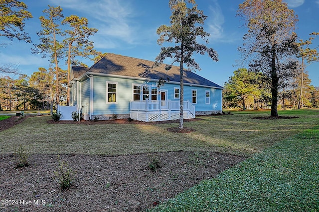 115 Genoes Point Rd SW, Supply, NC 28462 - back of house with a deck and a yard