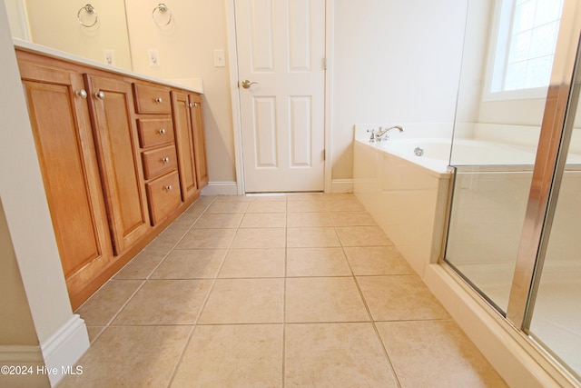 bathroom with separate shower and tub, tile patterned flooring, and vanity