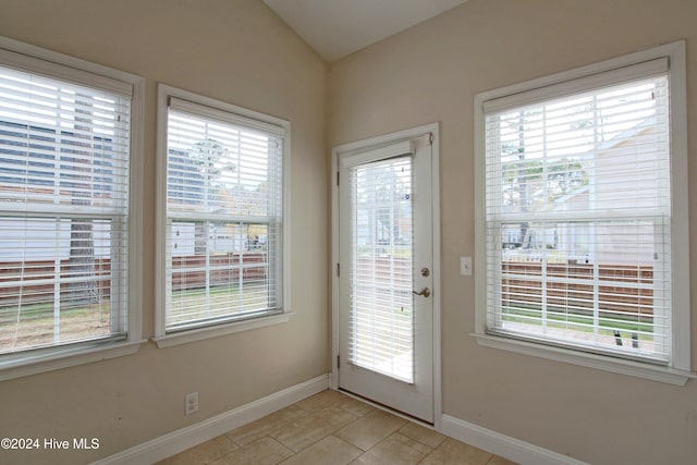 entryway featuring light tile patterned floors