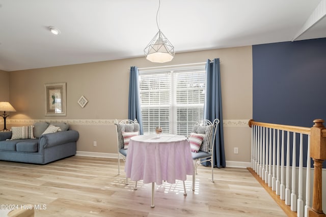 dining room with light wood-type flooring