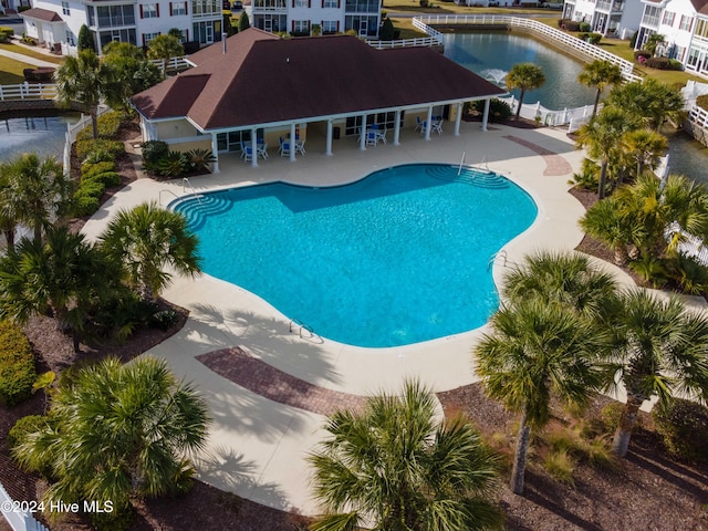 view of swimming pool featuring a patio