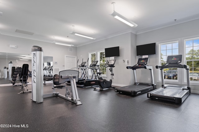 exercise room with ornamental molding