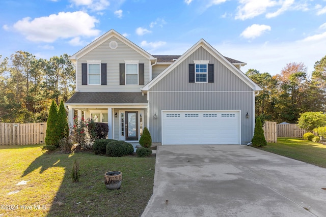 front facade featuring a garage and a front yard