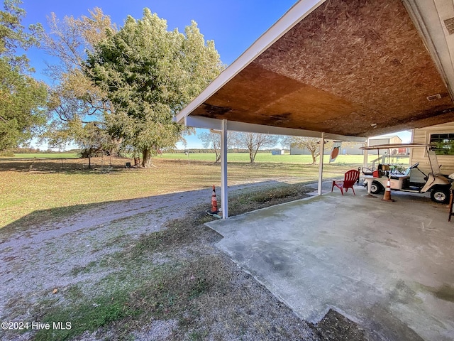 4271 Caratoke Hwy, Barco, NC 27917 - view of parking featuring a carport