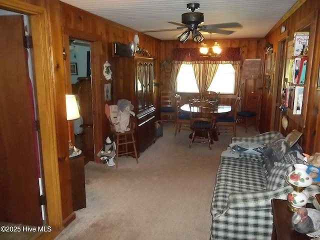 4271 Caratoke Hwy, Barco, NC 27917 - carpeted dining room with wood walls and a ceiling fan