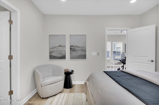 bedroom featuring light wood-type flooring