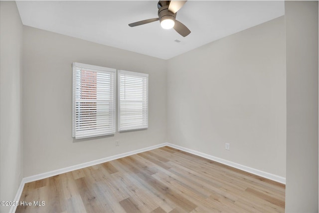 unfurnished room with light hardwood / wood-style flooring and ceiling fan