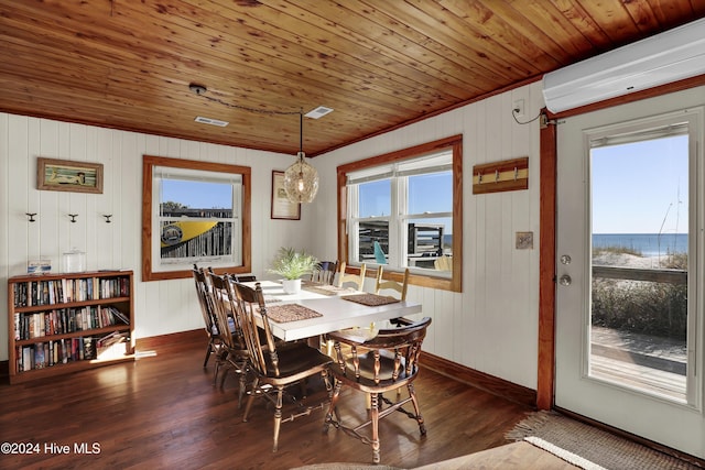 427 N Anderson Blvd, Topsail Beach, NC 28445 - dining space with wood ceiling, a wall mounted AC, dark wood finished floors, wooden walls, and baseboards